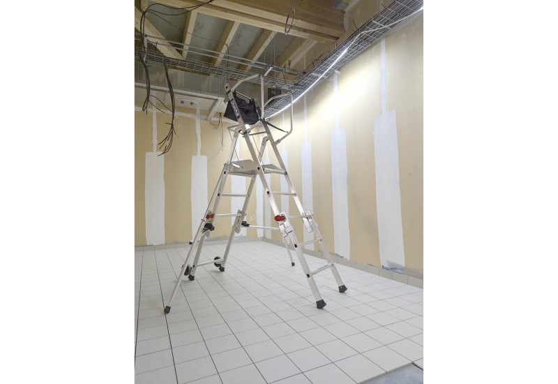 Détail des commandes latérales pour actionner les plans coulissants télescopiques