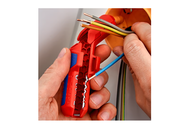 Repères de longueur et graduations intérieures du Knipex ErgoStrip.