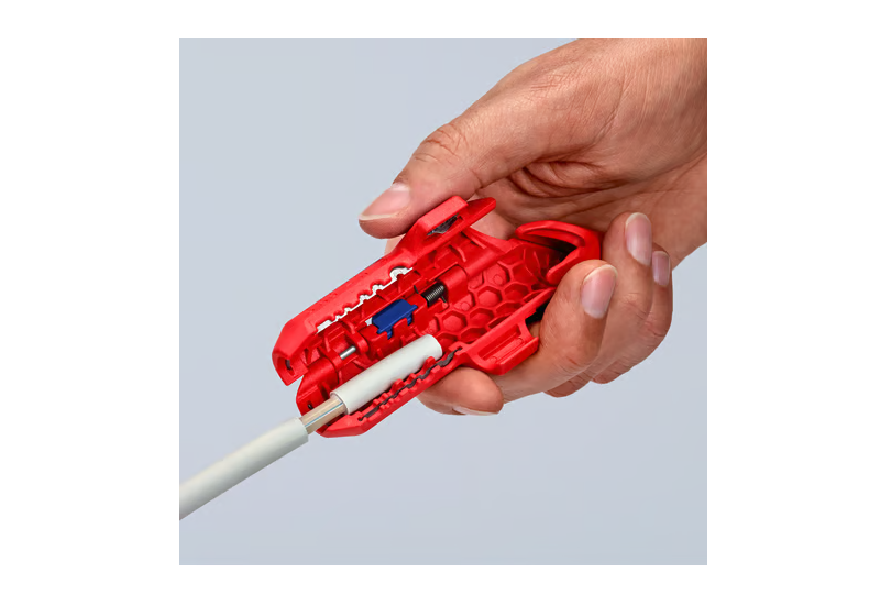 Coupe longitudinale d'un câble électrique avec l'ErgoStrip 135 mm.